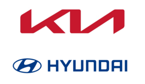 Red Kia brand logo displayed above the blue Hyundai oval logo.
